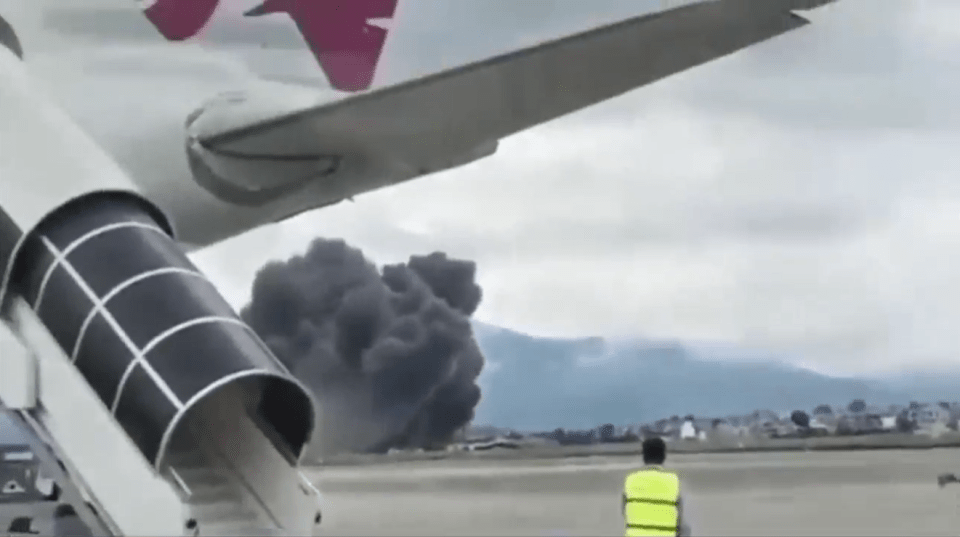 The passenger plane explodes as it collides with the runway