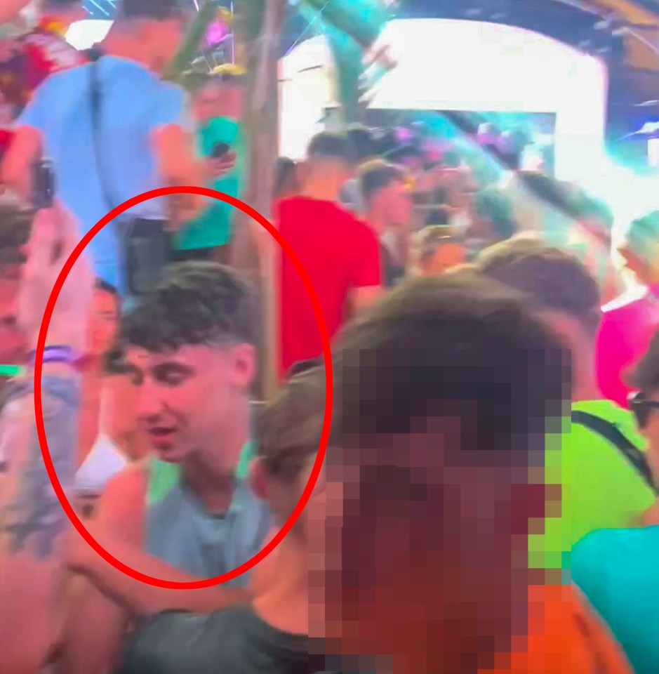 © Ian Whittaker.23/06/2024..A search continues for British teenager Jay Slater, who went missing on Monday after attending a dance music festival in Tenerife.Pictured. Jay Slater appears to stubble back to his feet as other partygoers watch on at the NRG festival on Sunday night (16/9/24). Jay is wearing a grey and green sports top around his neck...Photo credit: Ian Whittaker