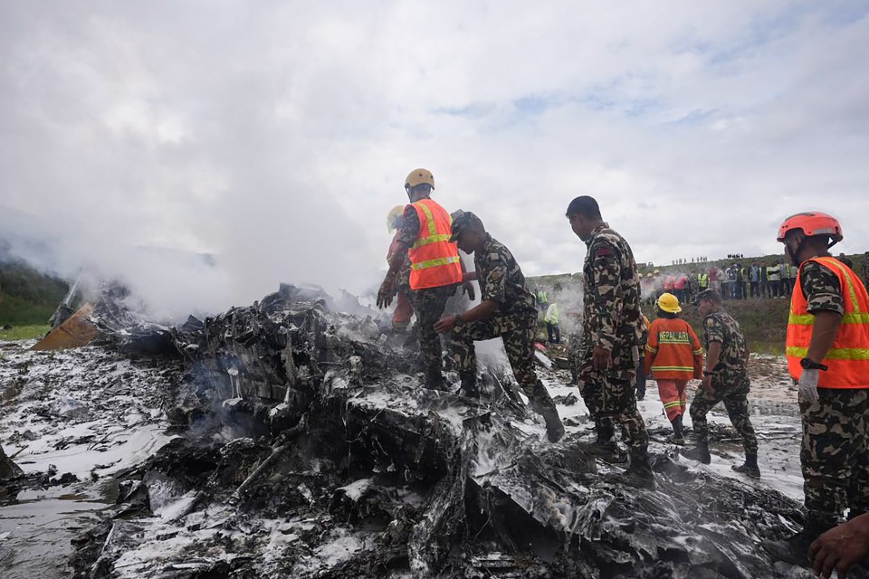 Fire crews were seen extinguishing the burning jet