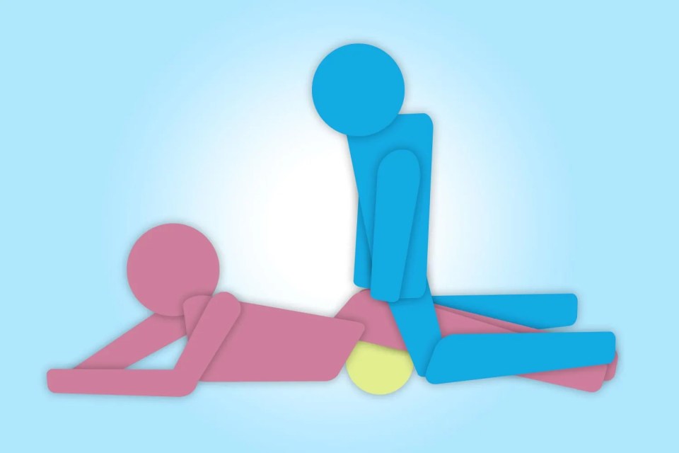 a blue stick figure is laying on a pink stick figure