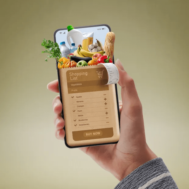 a person is holding a phone with a shopping list on the screen