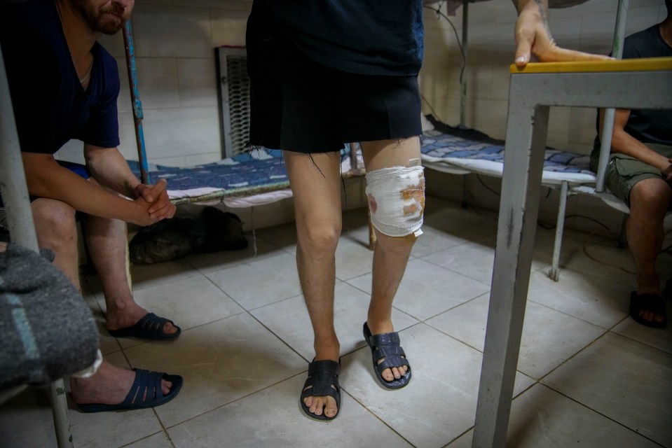 a person with a bandage on their leg