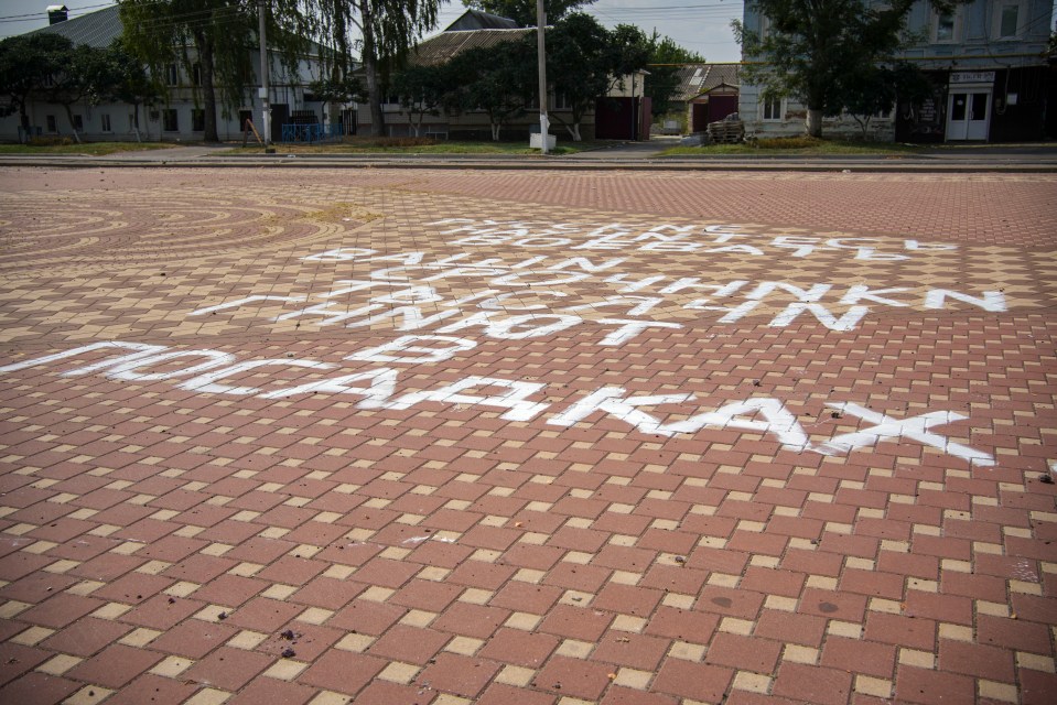a brick pavement has the word " nocapkax " written on it