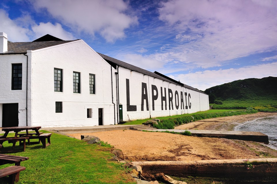 a large white building with the word laphroils painted on it