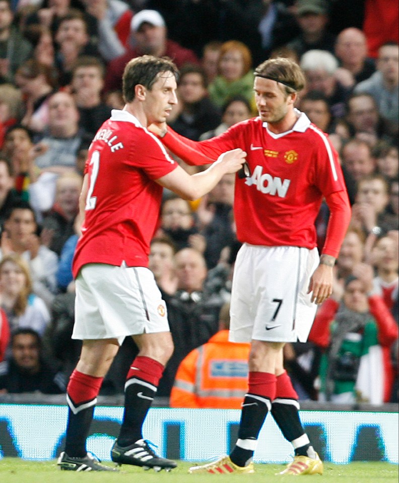 two soccer players one of whom has the number 7 on his jersey