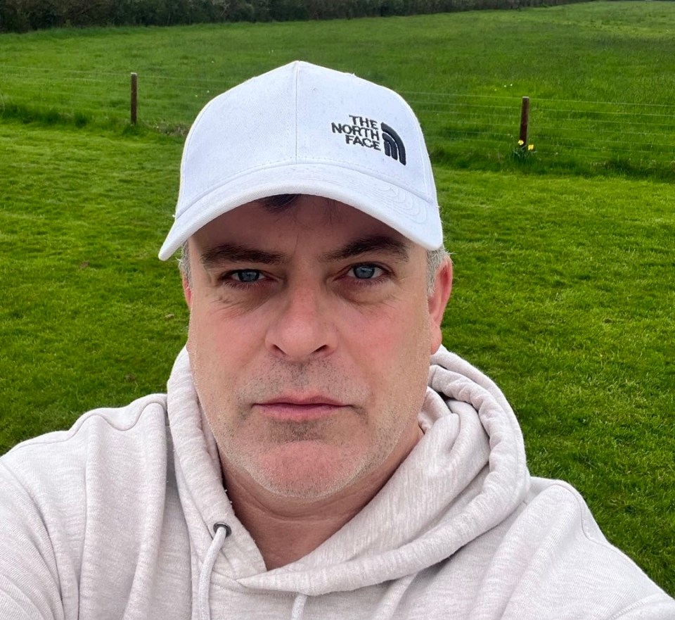 a man wearing a white hat that says the north face