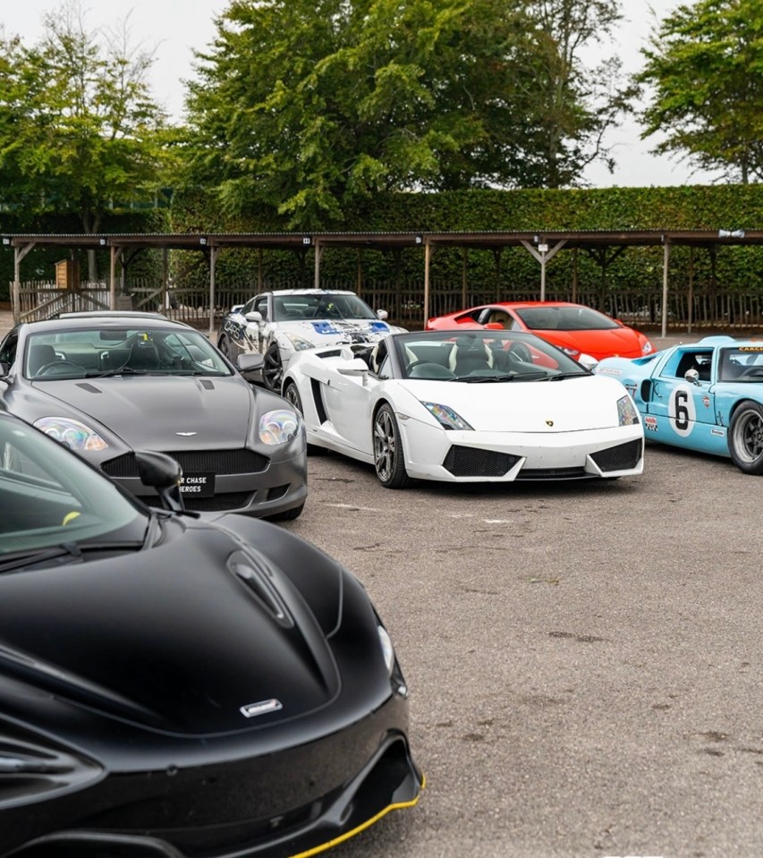 a row of sports cars including one with the number 6 on it