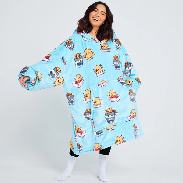 a woman wearing a blue blanket with french fries on it