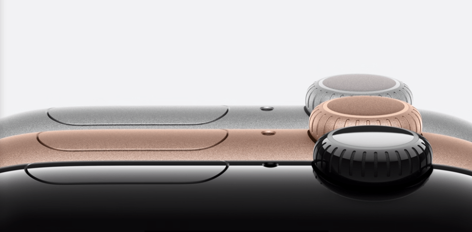 a close up of a silver and gold watch face