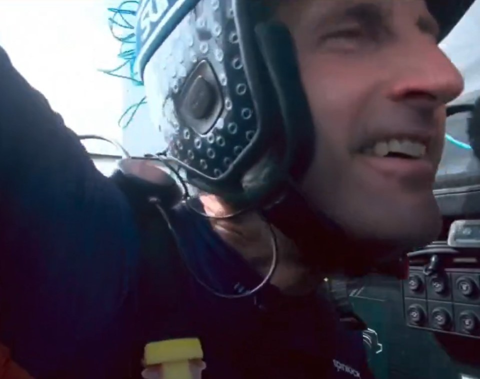 a man wearing a helmet with the word toprock on it