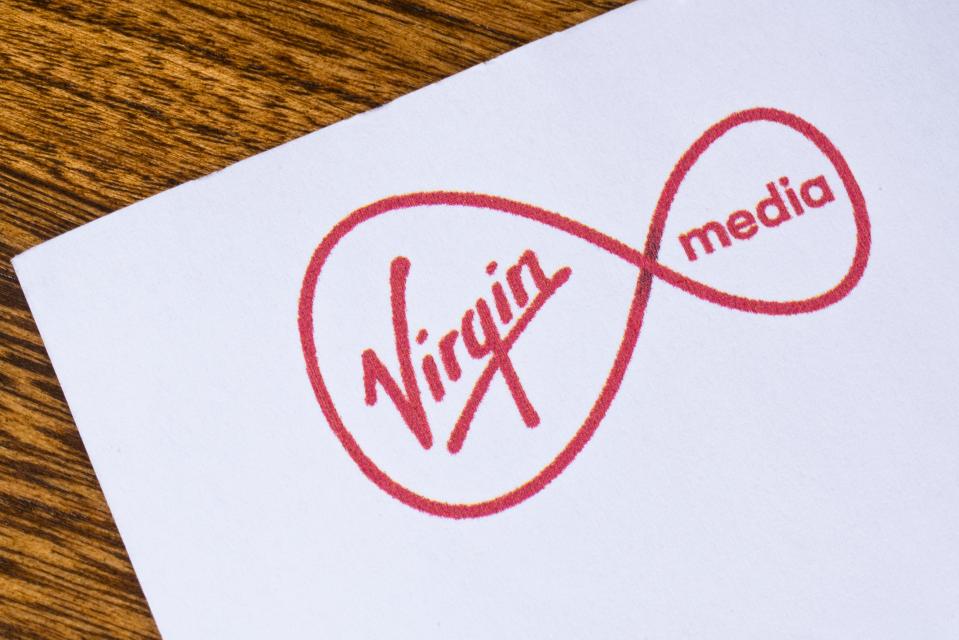 a piece of paper with the virgin media logo on it