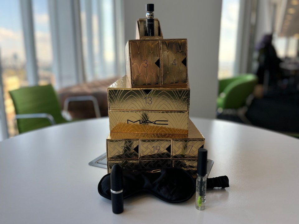 a stack of mac boxes on a table