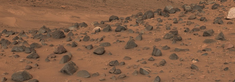 a pile of rocks in the middle of a desert