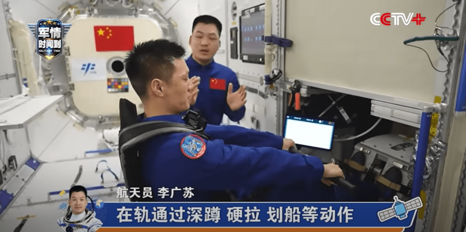 two men are in a room with a sign that says cctv+