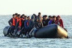 a group of people in a boat with one wearing a hoodie that says ' abercrombie &amp; fitch ' on it