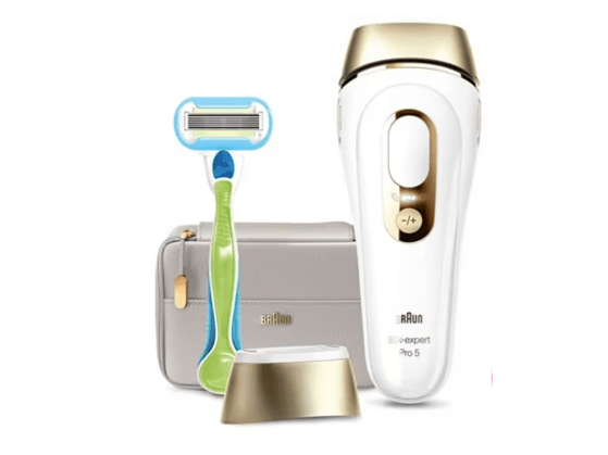 a braun hair removal device is next to a gillette razor