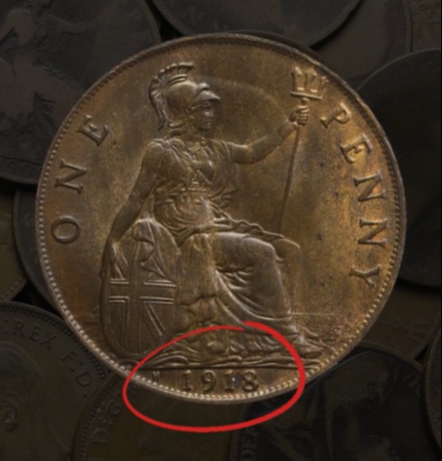 1918 British one penny coin.