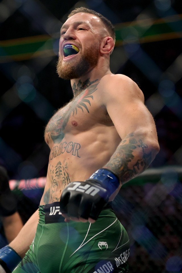 a man with a tattoo on his chest that says mcgregor