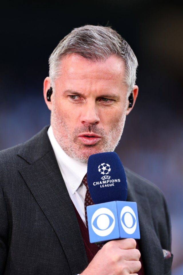a man in a suit is holding a microphone that says champions league