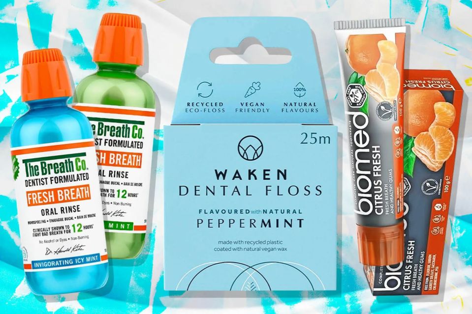 a bottle of waken dental floss next to a tube of biomed citrus fresh toothpaste