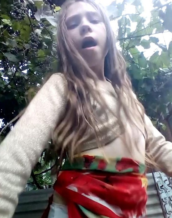 Girl dancing before leaving for Russian summer camp.