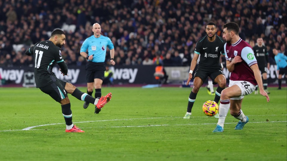 Mohamed Salah scoring a goal for Liverpool.