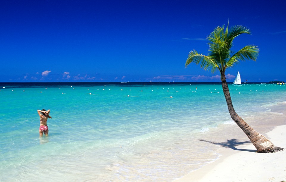 Woman in bikini on Negril beach in Jamaica.