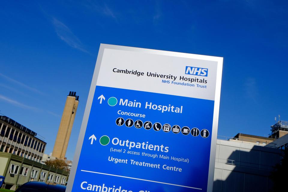 Cambridge University Hospitals NHS Foundation Trust sign: directions to main hospital and outpatient areas.