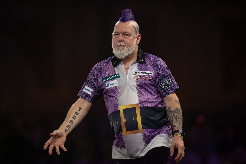 Peter Wright reacts during his World Darts Championship match.