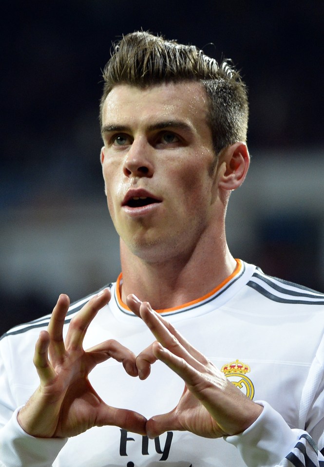 Gareth Bale of Real Madrid making a heart shape with his hands after scoring a goal.