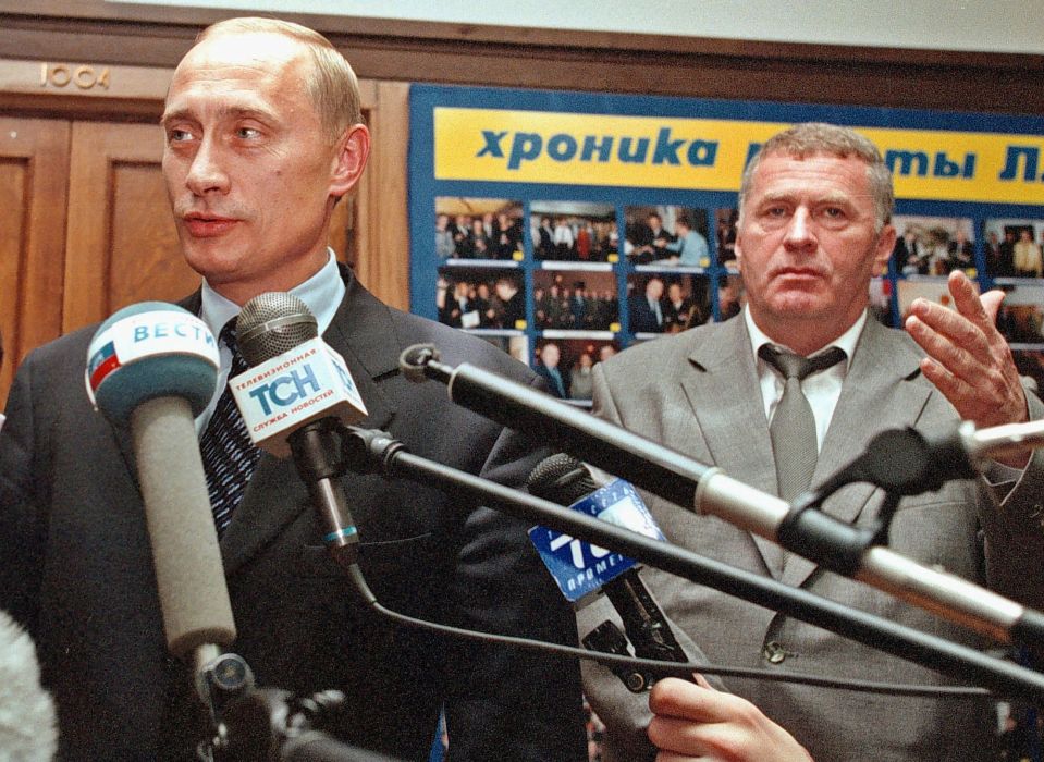 Vladimir Putin and Vladimir Zhirinovsky speaking to the media.