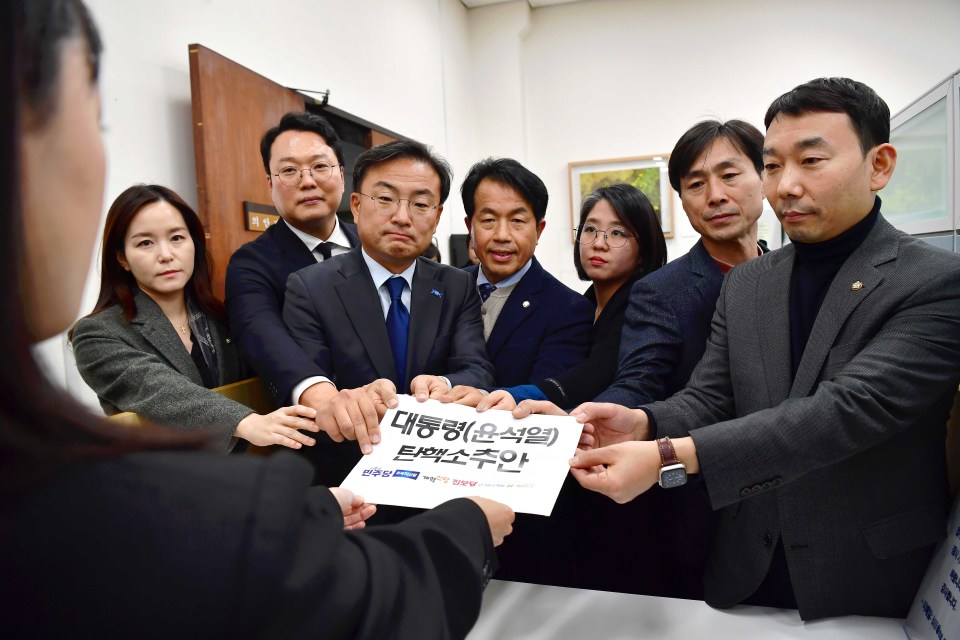 South Korean opposition party lawmakers submitting impeachment bill against President Yoon Suk Yeol.