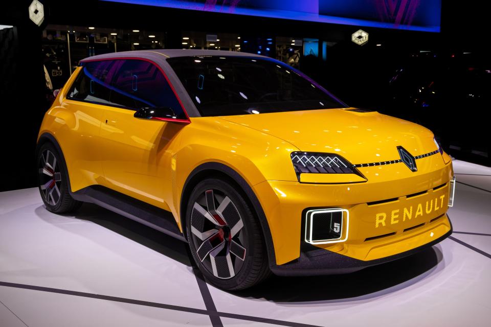 Yellow Renault 5 all-electric car.
