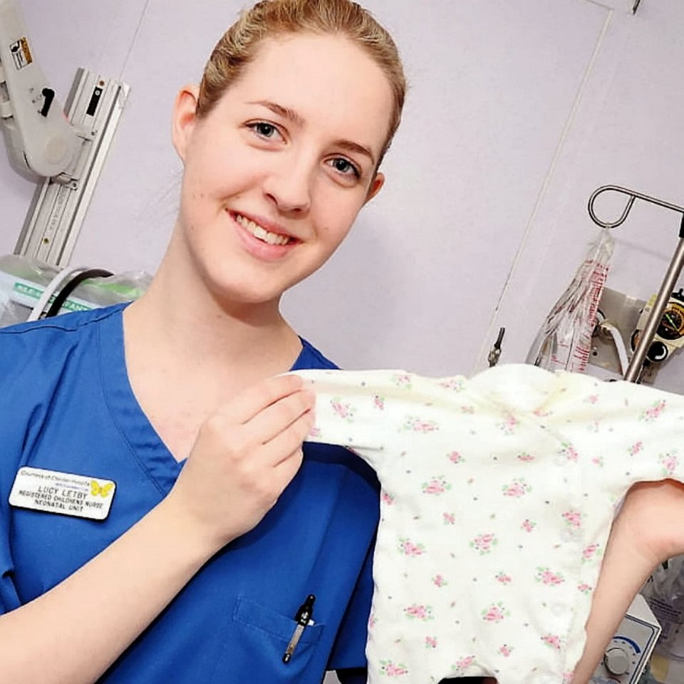 Photo of Lucy Letby, a neonatal nurse, holding a baby's garment.