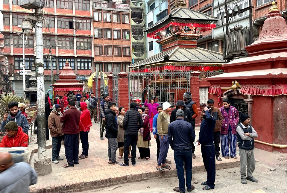 People gathered in Kathmandu after an earthquake in Tibet.