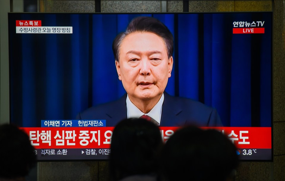 Yonhapnews TV broadcast showing President Yoon Suk Yeol's impeachment.