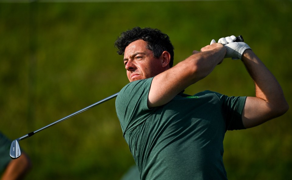 Rory McIlroy of Team Ireland watches a golf shot during a practice round.