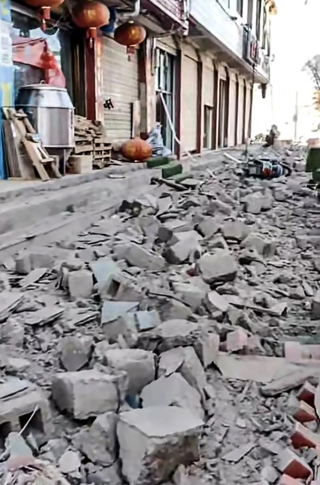 Debris on a road in Lhatse County, Tibet, after an earthquake.