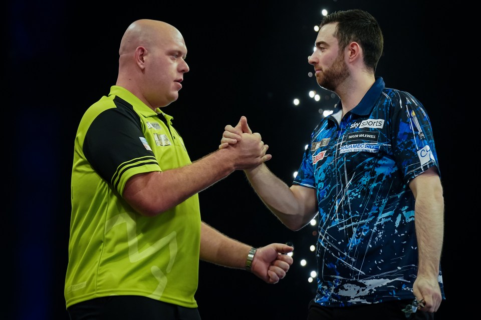 Michael van Gerwen and Luke Humphries at a darts match.