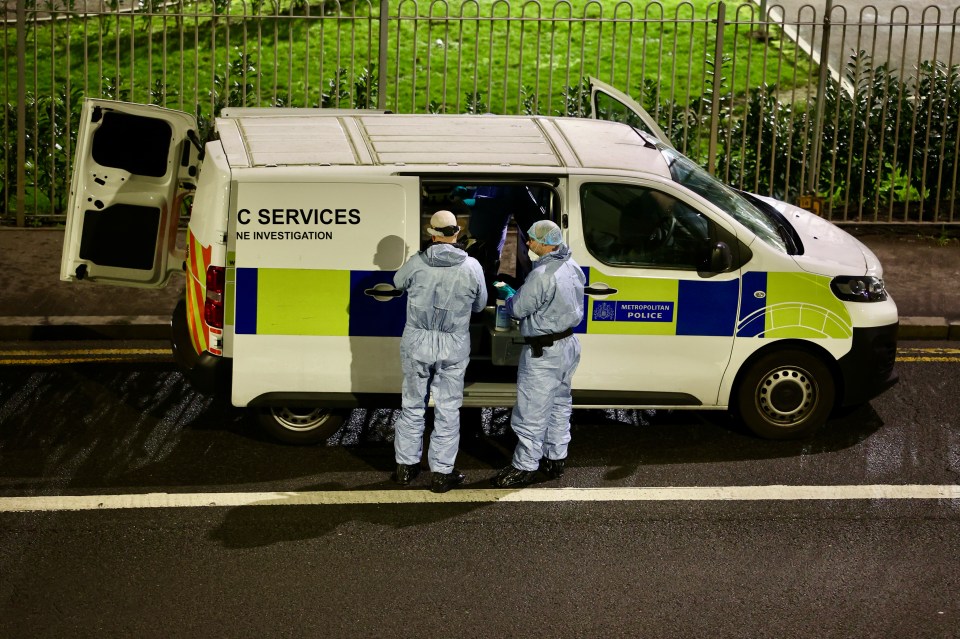 Forensic officers at a crime scene.