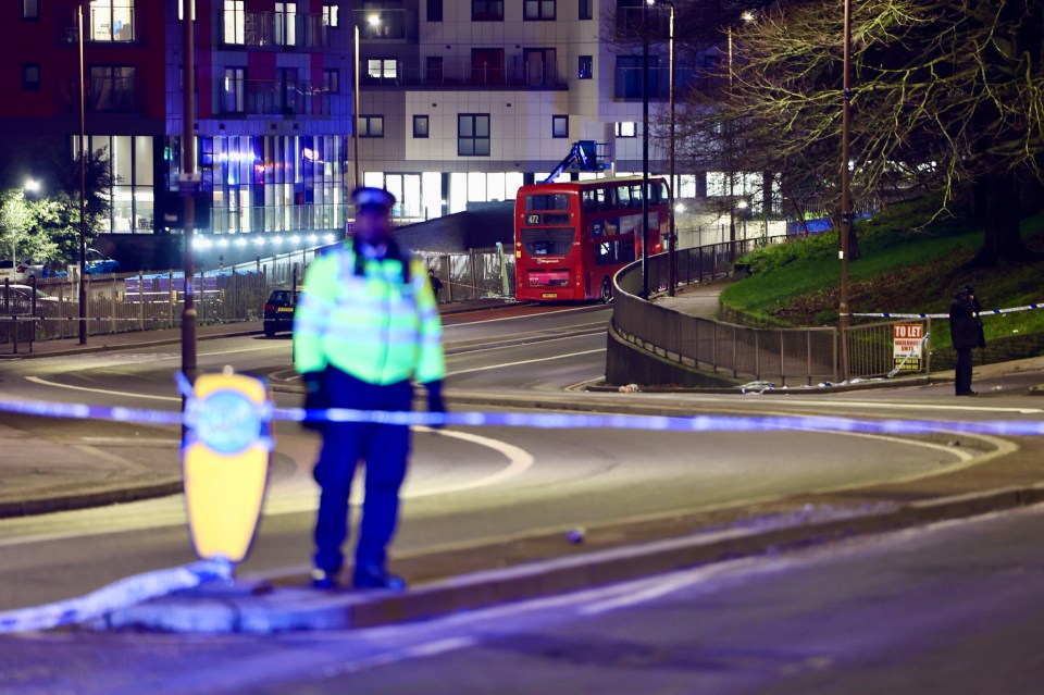 Police at a crime scene near a bus.