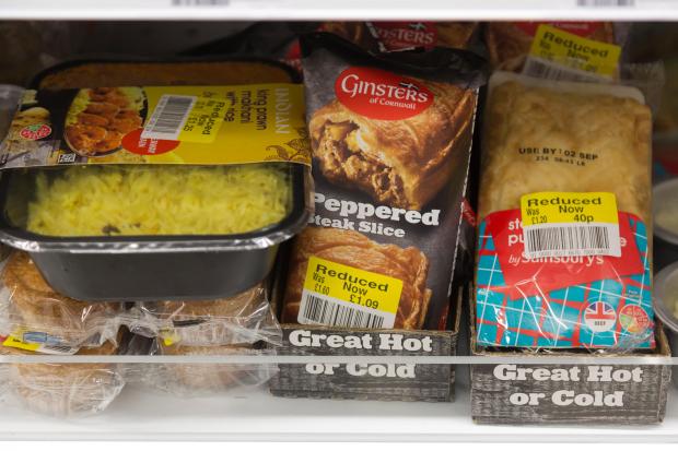 Reduced-price food items in a Sainsbury's supermarket.