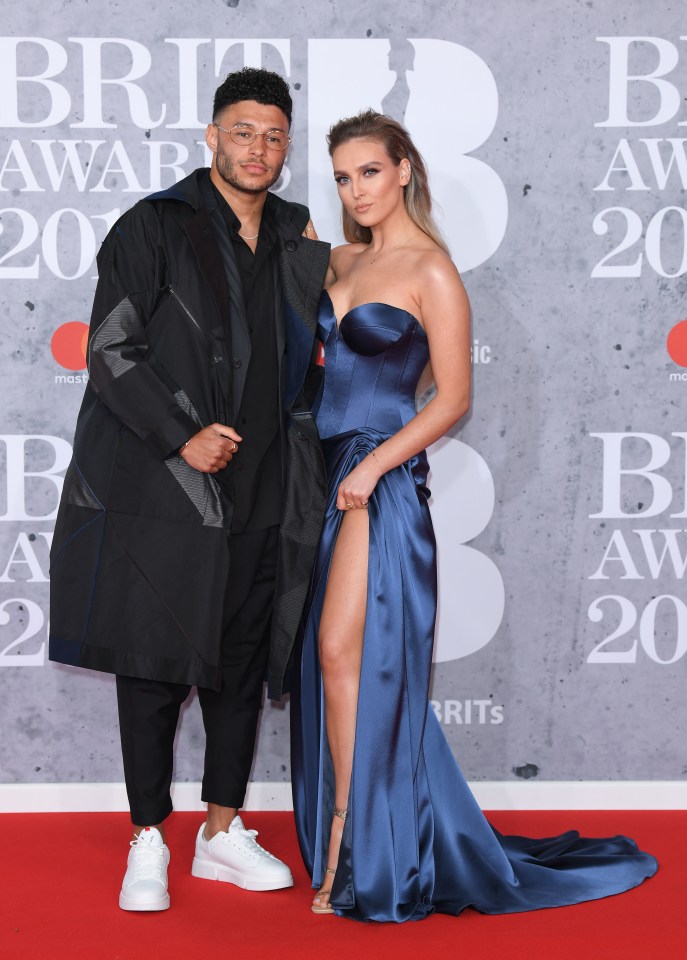 Alex Oxlade-Chamberlain and Perrie Edwards at the BRIT Awards.