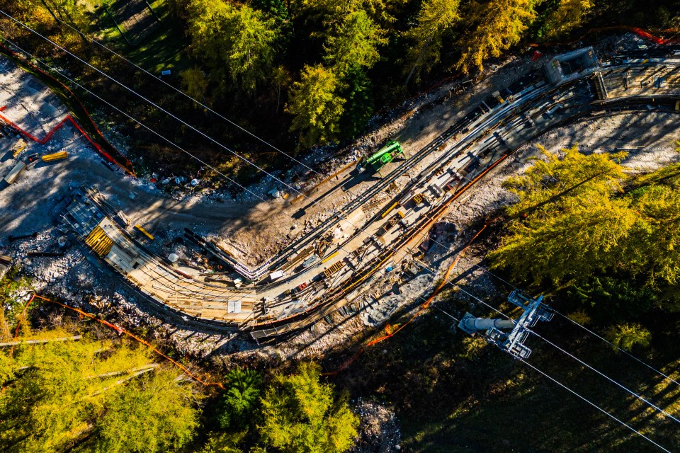 Aerial view of bobsleigh track construction in the Dolomites.