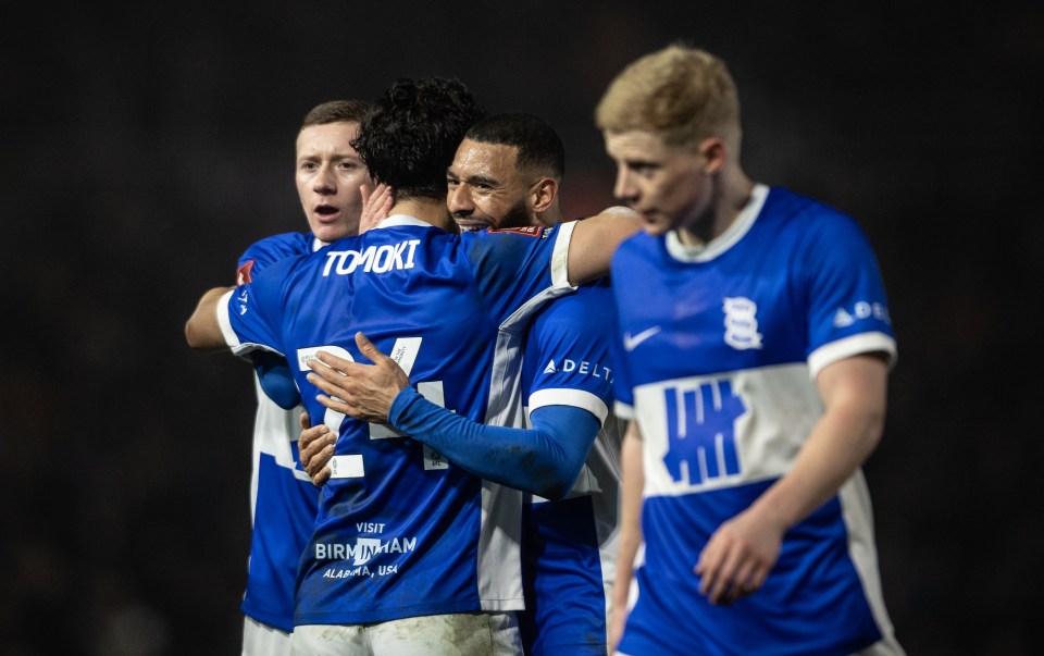 Birmingham City players celebrating a goal.