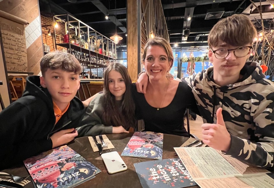 Family at restaurant table.