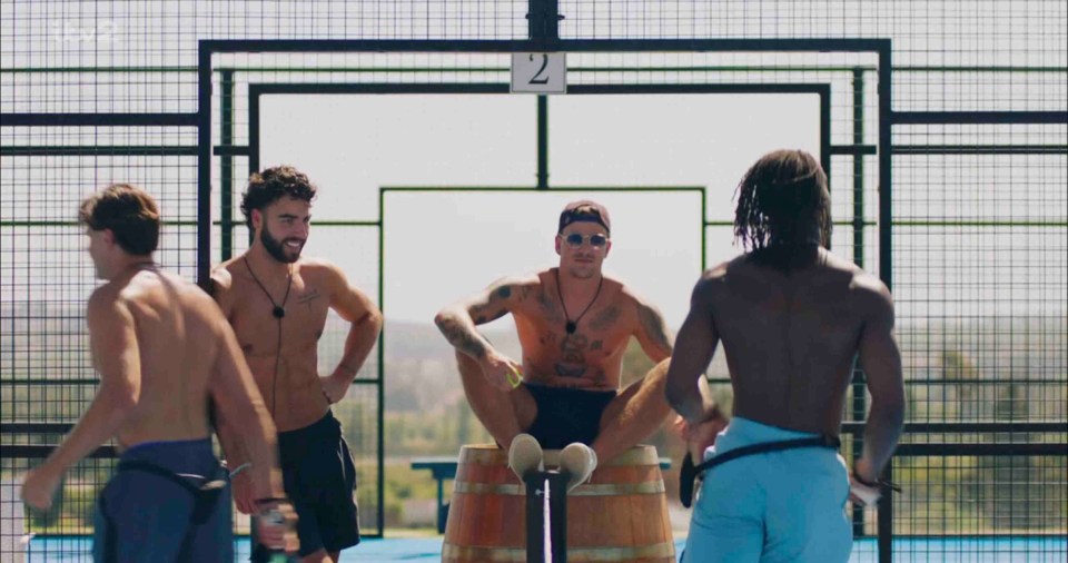 Men playing padel.