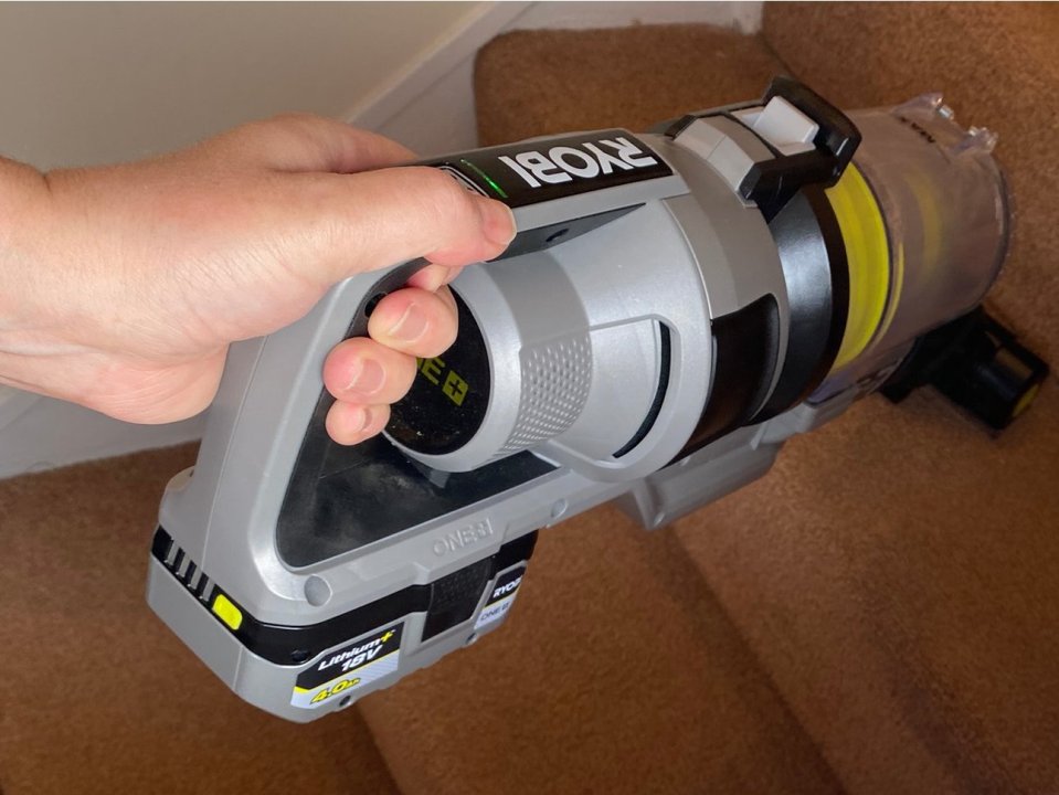 The Ryobi One+ stick vacuum in handheld mode