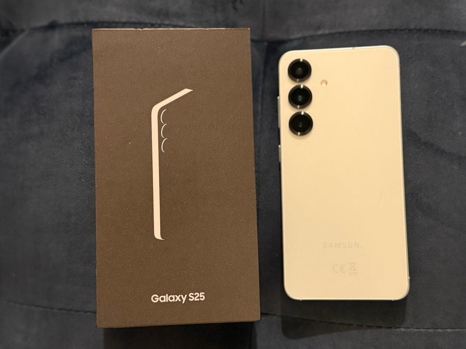 Samsung Galaxy S25 phone and box.