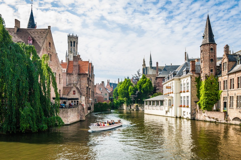 Boat tour on Bruges canal.